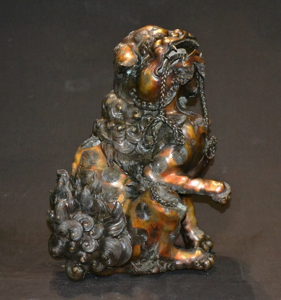 Lion bouddhique en bronze